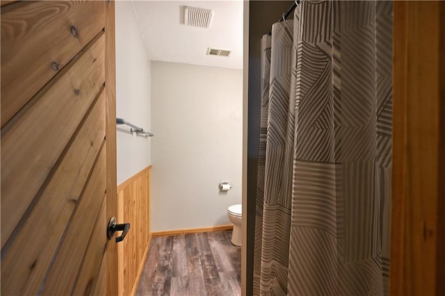 W7607 Whitetail Dr, Minong, WI 54859 - full bath with toilet, wood finished floors, a shower with curtain, and vanity