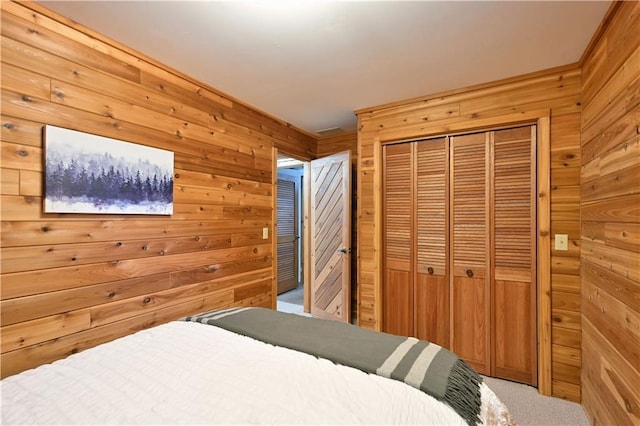 W7607 Whitetail Dr, Minong, WI 54859 - bedroom with wooden walls, carpet flooring, and a closet
