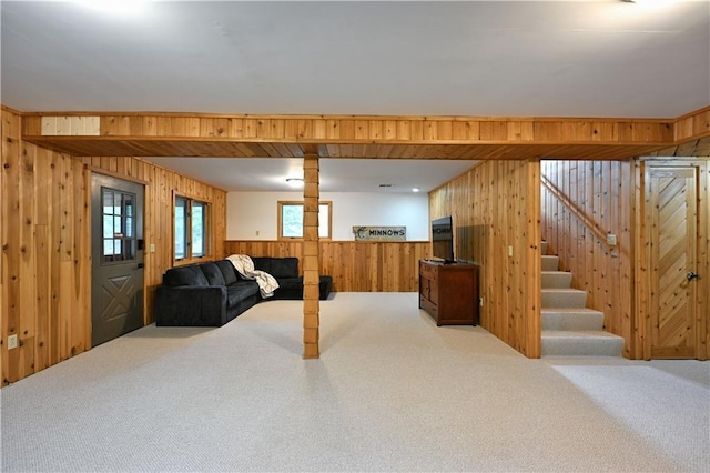 W7607 Whitetail Dr, Minong, WI 54859 - basement featuring wood walls, carpet flooring, and stairway