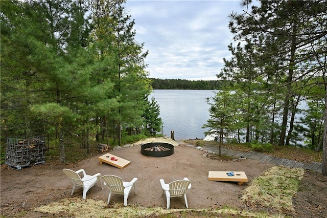 W7607 Whitetail Dr, Minong, WI 54859 - water view featuring a fire pit and a heavily wooded area