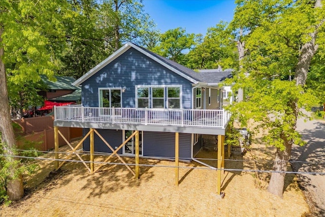 103 Lake Ct, Edgerton, WI 53534 - rear view of house with a deck