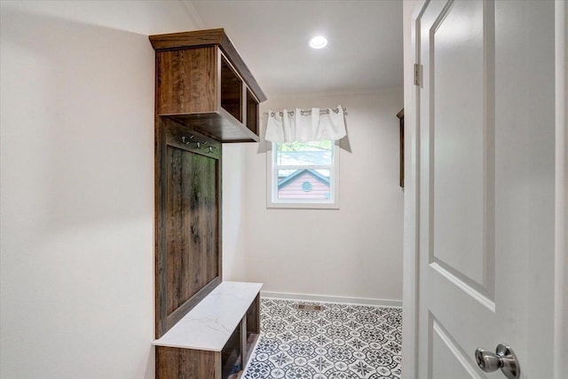 103 Lake Ct, Edgerton, WI 53534 - mudroom with baseboards, recessed lighting, and ornamental molding