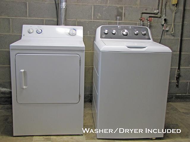 79 1st Ave, Benton, WI 53803 - laundry area with washer and dryer and concrete block wall