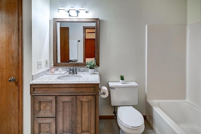 906 Spahn Dr, Waunakee, WI 53597 - bathroom with vanity, toilet, baseboards, and tub / shower combination