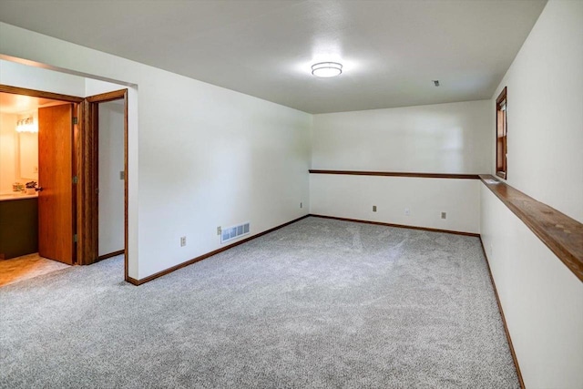 906 Spahn Dr, Waunakee, WI 53597 - empty room with carpet floors and baseboards