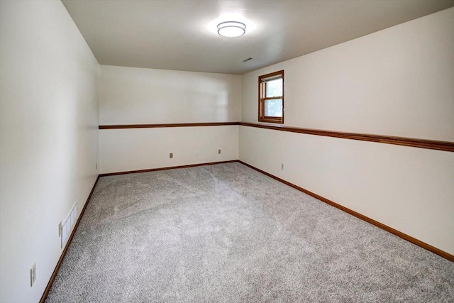 906 Spahn Dr, Waunakee, WI 53597 - spare room featuring carpet flooring and baseboards