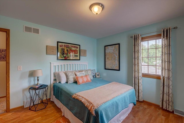2330 Mica Rd, Madison, WI 53719 - bedroom with wood finished floors and baseboards