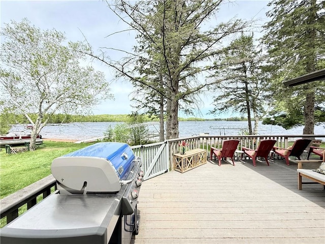 15249 W Bills Rd Unit 5, Hayward, WI 54843 - wooden deck with a water view, area for grilling, and a yard