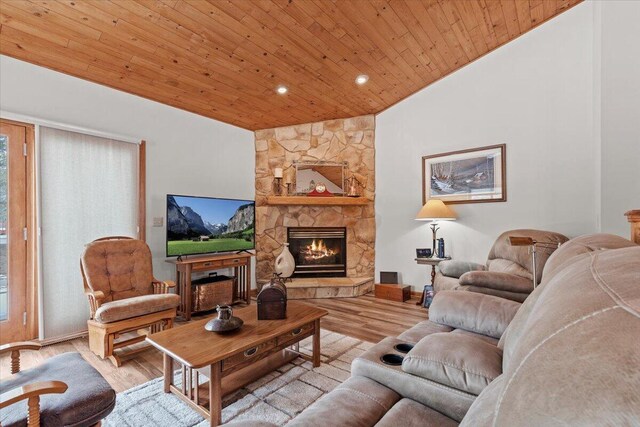 1502 Ridgewood Dr Unit D-7, West Bend, WI 53095 - living area with wooden ceiling, a fireplace, wood finished floors, plenty of natural light, and recessed lighting