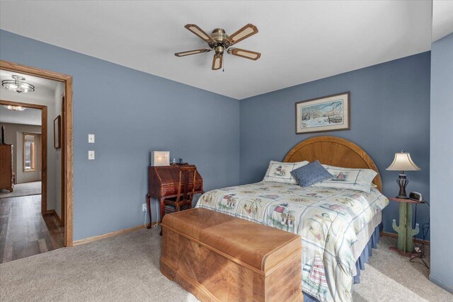 1502 Ridgewood Dr Unit D-7, West Bend, WI 53095 - bedroom featuring carpet flooring, baseboards, and ceiling fan