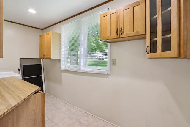 E14485 Baltic Ave, Merrimac, WI 53561 - kitchen featuring ornamental molding, light tile patterned flooring, glass insert cabinets, and recessed lighting