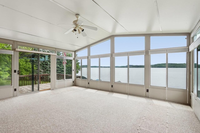E14485 Baltic Ave, Merrimac, WI 53561 - unfurnished sunroom with a water view, ceiling fan, healthy amount of natural light, and vaulted ceiling