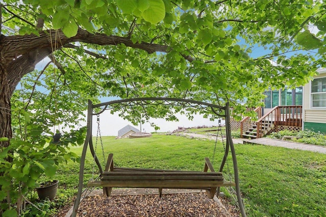 E14485 Baltic Ave, Merrimac, WI 53561 - view of grassy yard with a sunroom and stairway