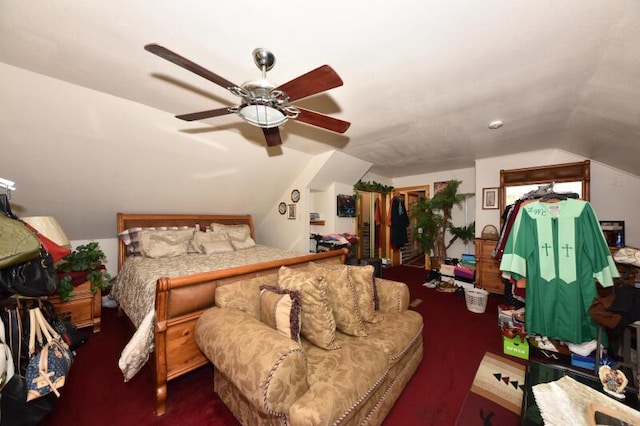 carpeted bedroom featuring lofted ceiling and ceiling fan