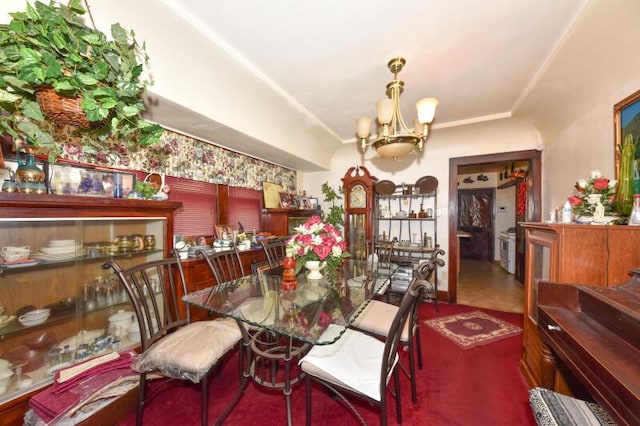 dining room featuring a chandelier