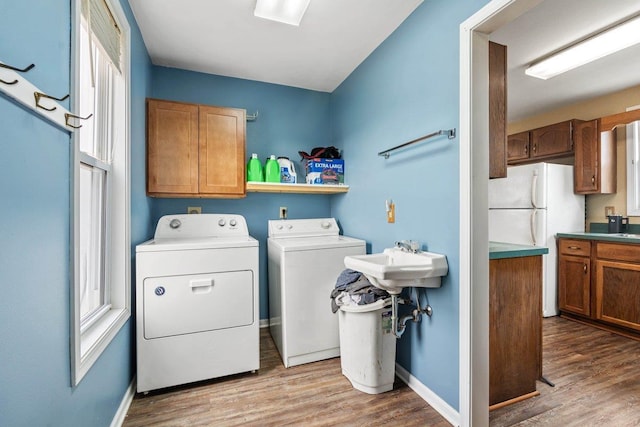4084 Eagle Mound Pass, Deforest, WI 53532 - washroom featuring separate washer and dryer, wood finished floors, and baseboards