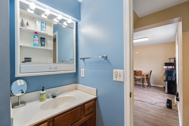 4084 Eagle Mound Pass, Deforest, WI 53532 - bathroom with wood finished floors and vanity