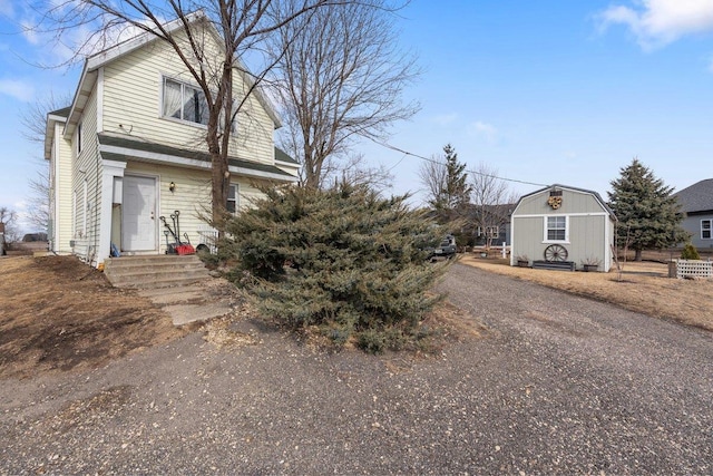 4084 Eagle Mound Pass, Deforest, WI 53532 - view of home's exterior with entry steps and a gambrel roof