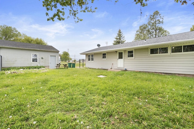 538 124th St, Franksville, WI 53126 - rear view of house with a lawn
