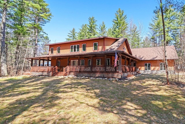7496 River Rd, Lake Tomahawk, WI 54558 - back of property featuring a yard and a porch
