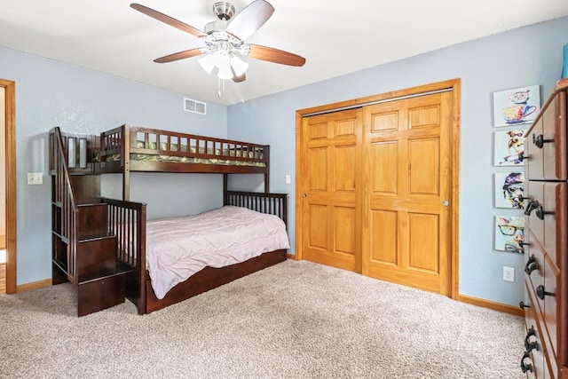 7496 River Rd, Lake Tomahawk, WI 54558 - bedroom featuring carpet floors, baseboards, ceiling fan, and a closet