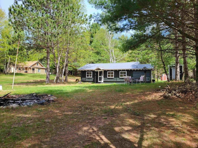11586 Hidden Haven Dr, Hazelhurst, WI 54531 - rear view of house with a lawn