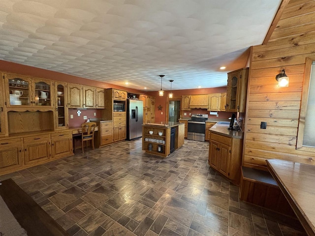 221545 Azalea Rd, Wausau, WI 54401 - kitchen with appliances with stainless steel finishes, a sink, a kitchen island, brown cabinets, and glass insert cabinets