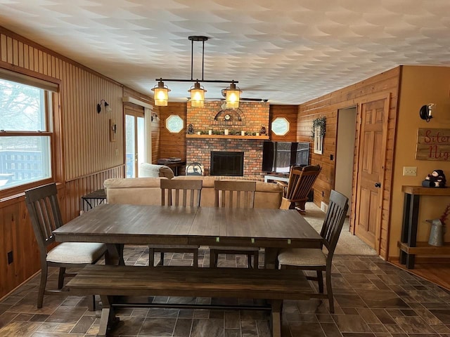 221545 Azalea Rd, Wausau, WI 54401 - dining room with wood walls and a brick fireplace