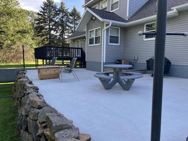 221545 Azalea Rd, Wausau, WI 54401 - view of patio with a wooden deck and central AC unit