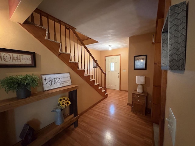 221545 Azalea Rd, Wausau, WI 54401 - entrance foyer featuring light wood-style floors and stairs