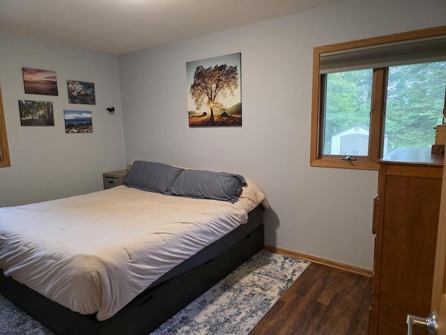 219 Park Ave, Eagle, WI 53119 - bedroom featuring wood finished floors and baseboards