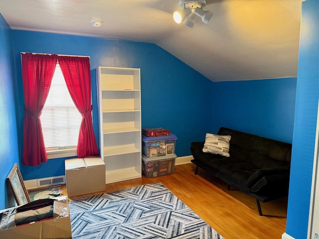 514 W 9th Ave, Ashland, WI 54806 - living area with lofted ceiling and wood finished floors