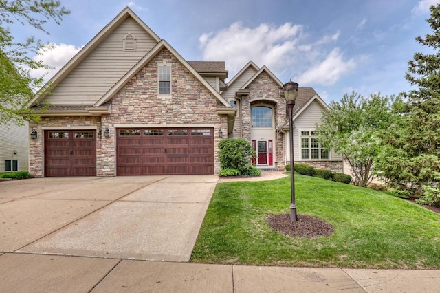 1826 Stonebridge Rd, Waukesha, WI 53188 - view of front of home featuring stone siding, concrete driveway, and a front yard