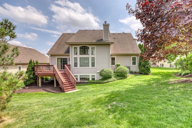 1826 Stonebridge Rd, Waukesha, WI 53188 - rear view of property featuring a wooden deck, stairway, a chimney, a yard, and a shingled roof