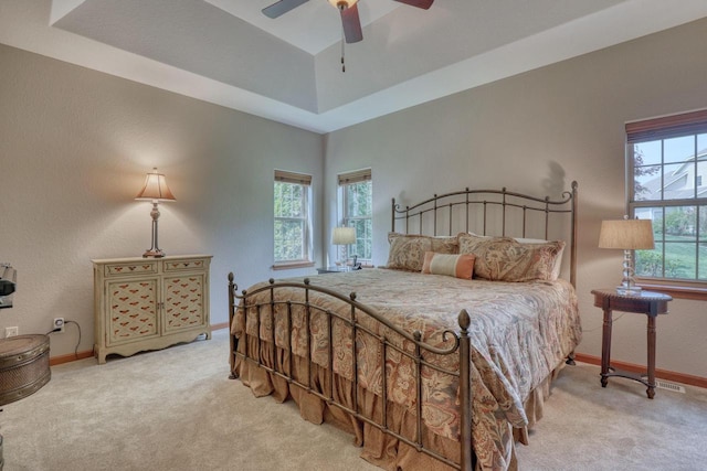 1826 Stonebridge Rd, Waukesha, WI 53188 - carpeted bedroom featuring baseboards, a ceiling fan, and a tray ceiling