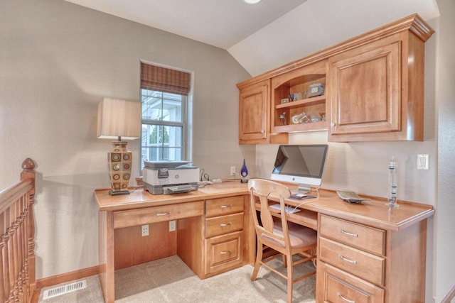 1826 Stonebridge Rd, Waukesha, WI 53188 - home office featuring built in desk, vaulted ceiling, and light carpet