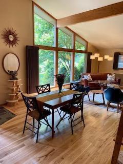3914 Priscilla Ln, Madison, WI 53705 - dining area with expansive windows and light wood-type flooring
