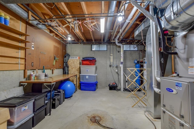 3914 Priscilla Ln, Madison, WI 53705 - unfinished below grade area featuring a workshop area and heating unit