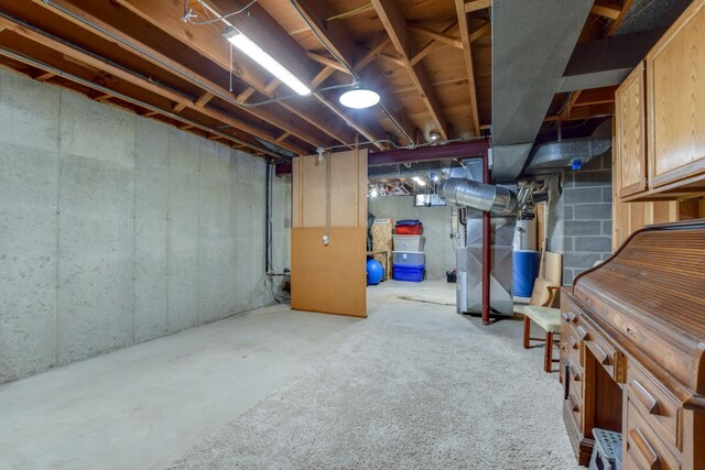 3914 Priscilla Ln, Madison, WI 53705 - unfinished basement with heating unit and water heater