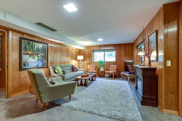 3914 Priscilla Ln, Madison, WI 53705 - living area featuring wooden walls and baseboards