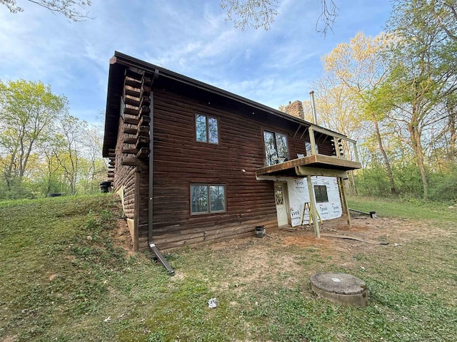 N8718 Starr Rd, Portage, WI 53901 - back of house featuring log exterior