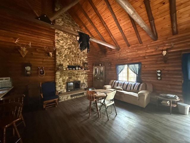 N8718 Starr Rd, Portage, WI 53901 - living room featuring wooden ceiling with exposed beams, high vaulted ceiling, wood finished floors, and a fireplace