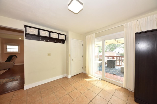 3727 E Layton Ave, Cudahy, WI 53110 - empty room with light tile patterned floors and baseboards
