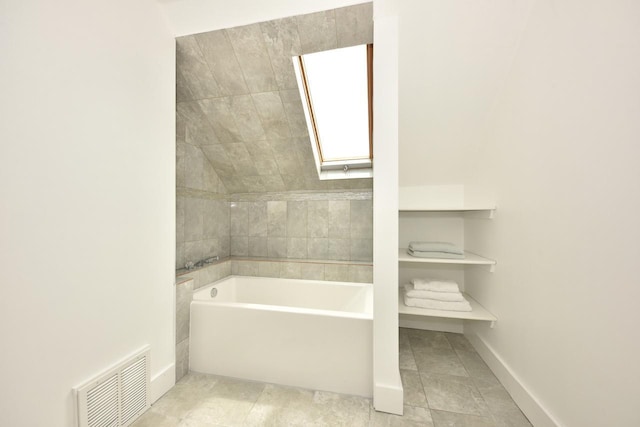 3727 E Layton Ave, Cudahy, WI 53110 - full bath with a skylight, a bath, baseboards, and tile patterned flooring