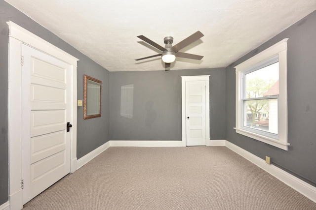 3727 E Layton Ave, Cudahy, WI 53110 - empty room featuring a ceiling fan, carpet, and baseboards
