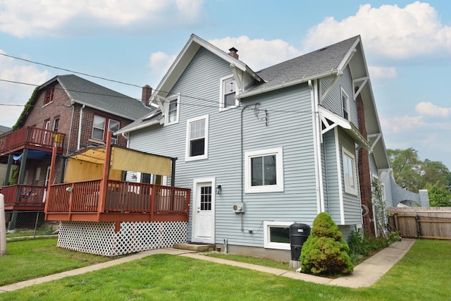 3727 E Layton Ave, Cudahy, WI 53110 - rear view of property with a wooden deck and a chimney
