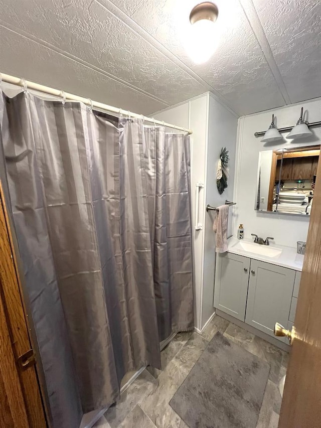 3185 S Faust Lake Rd, Rhinelander, WI 54501 - bathroom with vanity and a shower with shower curtain