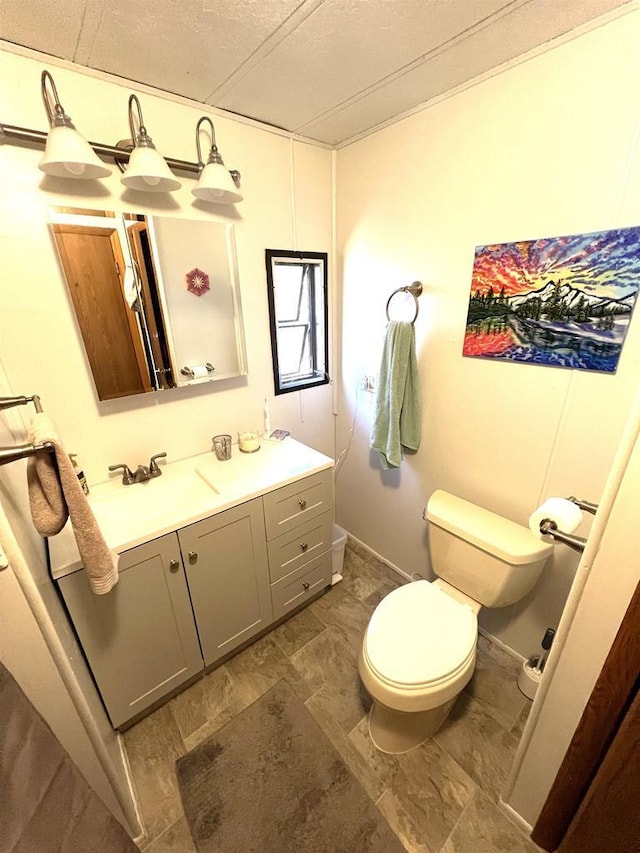 3185 S Faust Lake Rd, Rhinelander, WI 54501 - bathroom with toilet and vanity