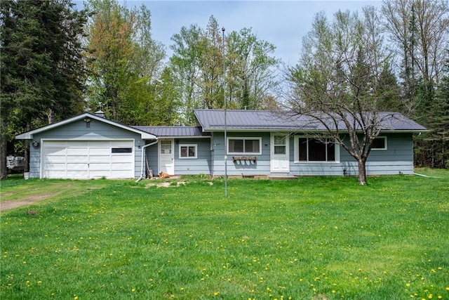 4620W Sweitzer Rd, Winter, WI 54896 - ranch-style home featuring a front yard, metal roof, a garage, a standing seam roof, and driveway