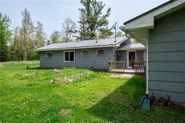 4620W Sweitzer Rd, Winter, WI 54896 - back of house with a yard and a deck